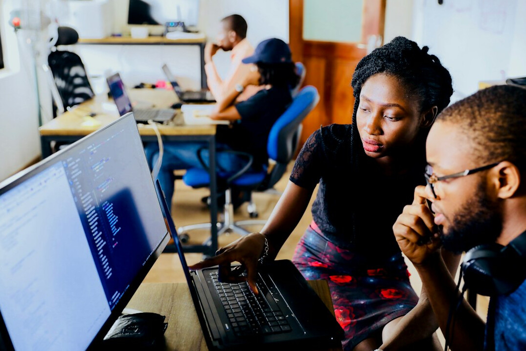 programmers coding on computers